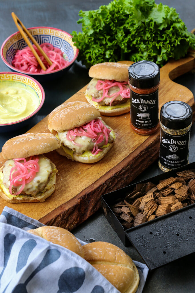 To show the Jack Daniel's Seasoning that is used in a smoked pork burger.