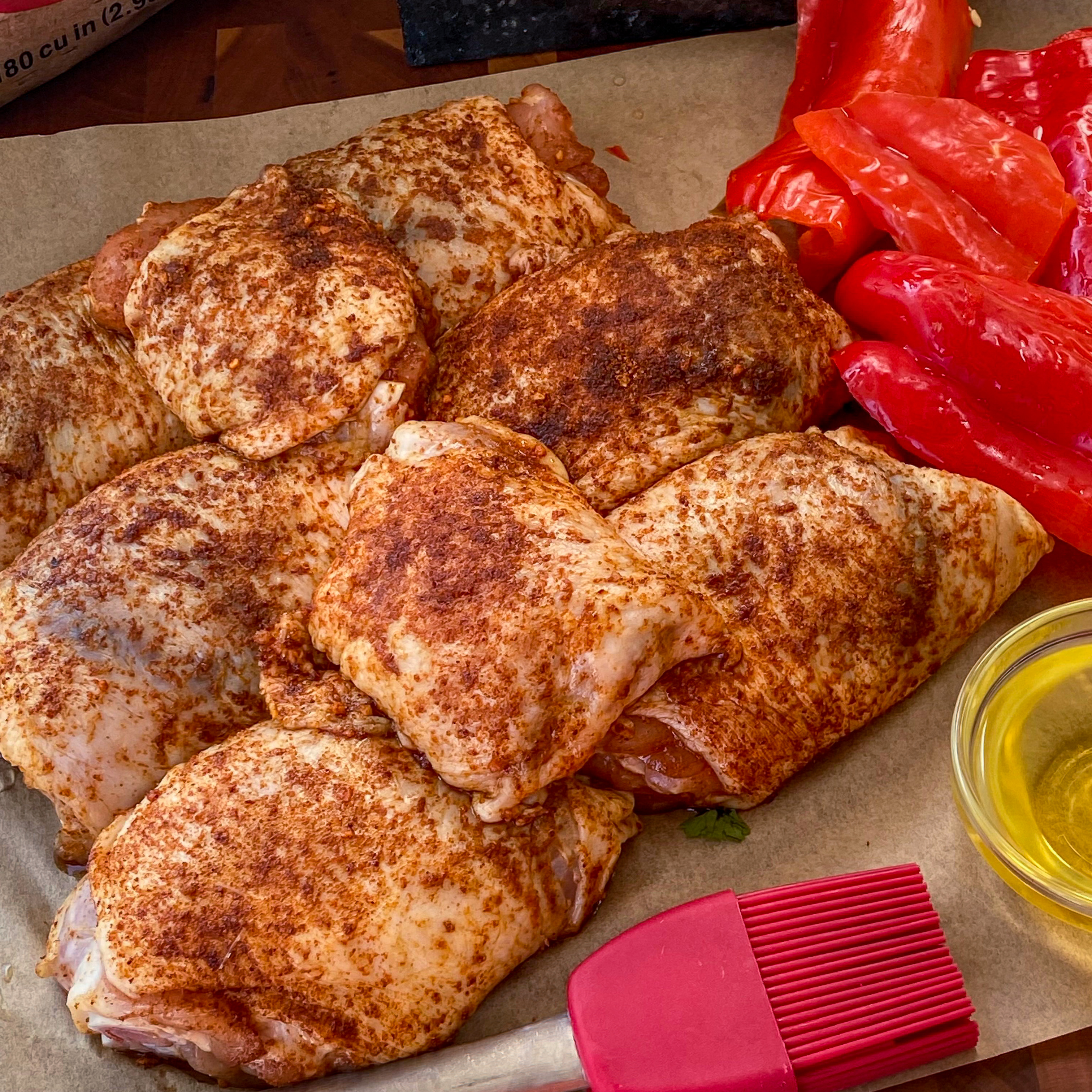 Wrap seasoned chicken skin into a bundle. Chicken is not ready to grill. 