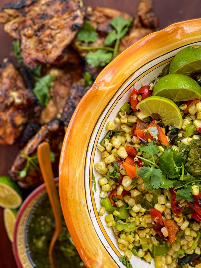 To show side dishes that compliment smoked chicken in texture and flavor. Smoked Salsa Verde and Charred Corn Salad.   