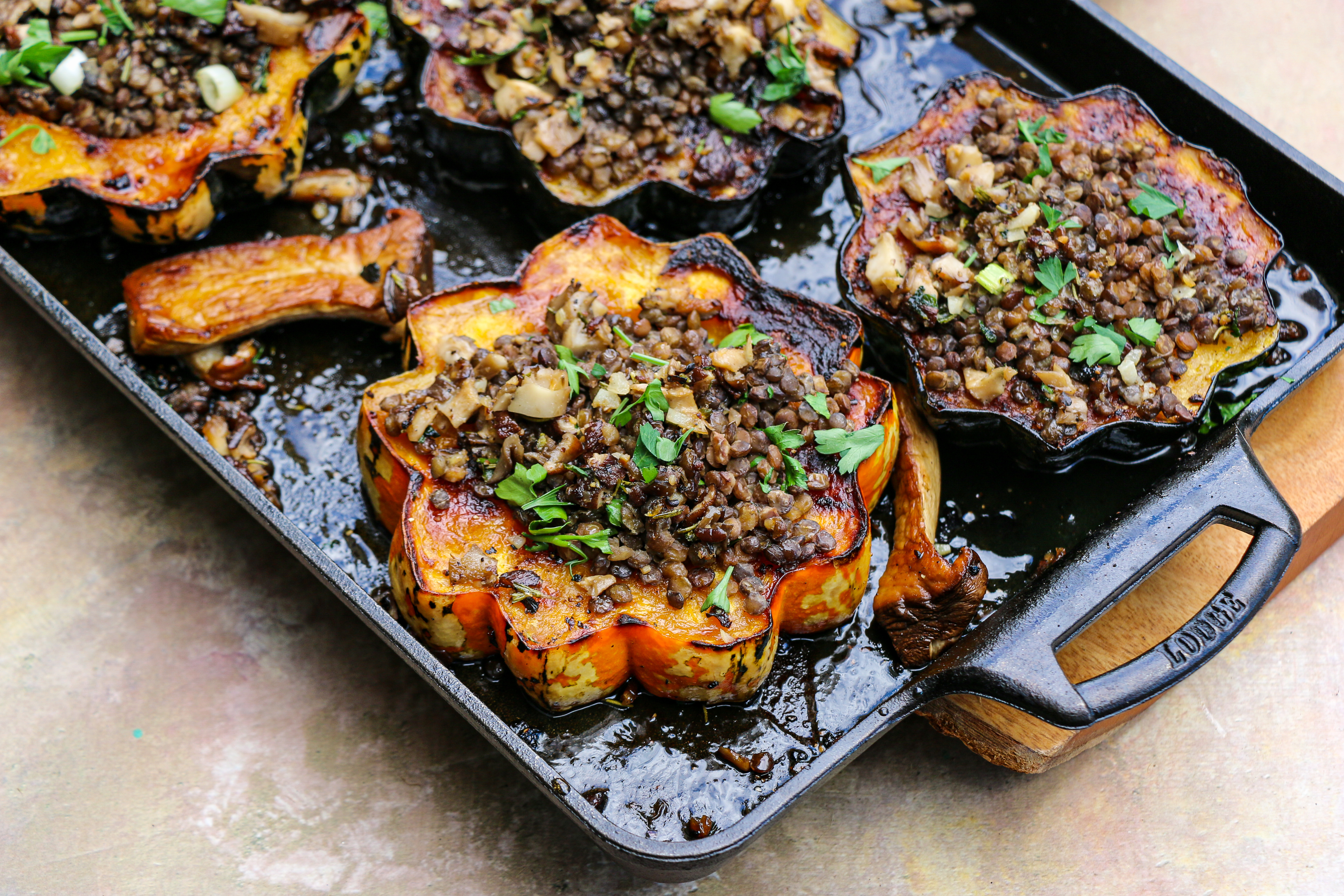 Maple smoked acorn squash filled with lentils.