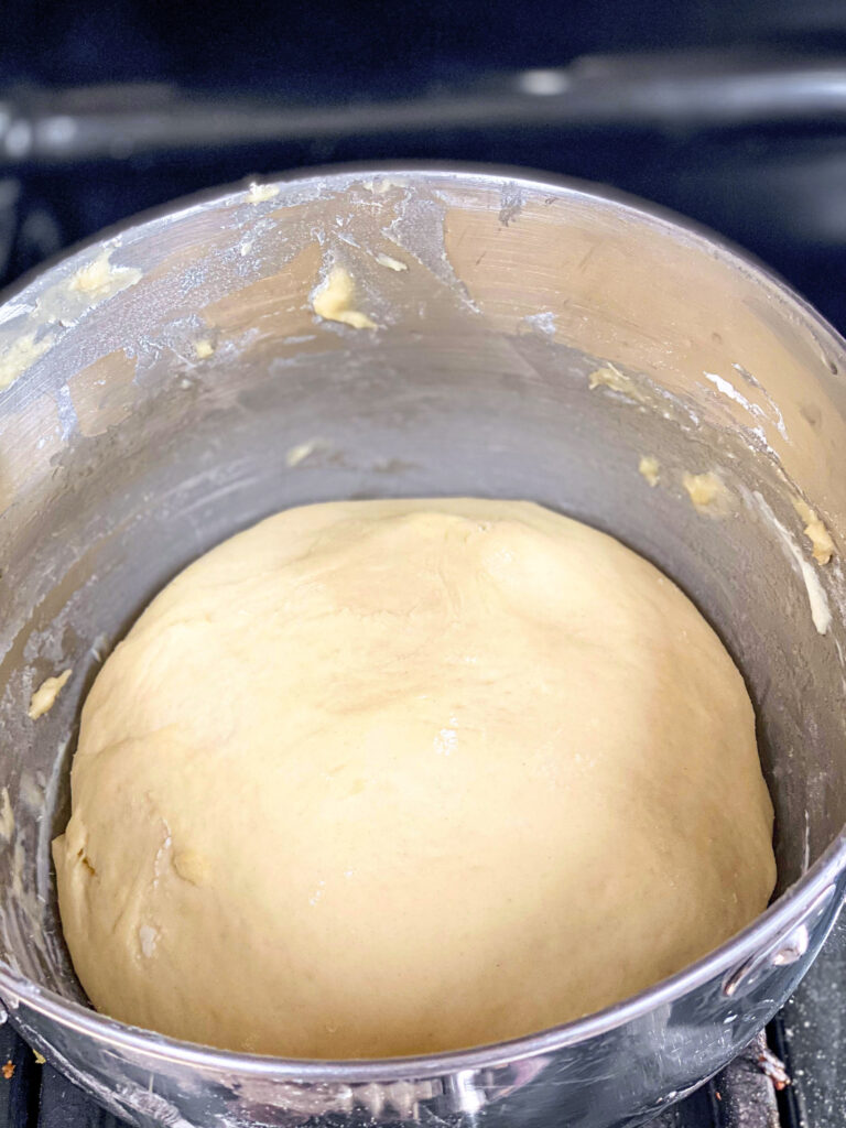 Sourdough Pizza Dough rising in a bowl. 