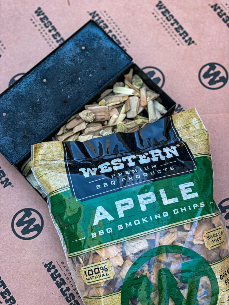 Western BBQ Apple Chips fill a smoker box.