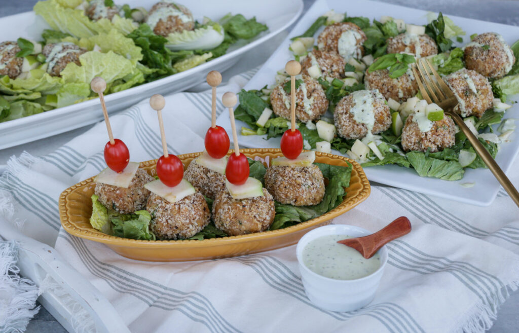 Smoked Chicken Meatball skewers with tomato and green apple. 