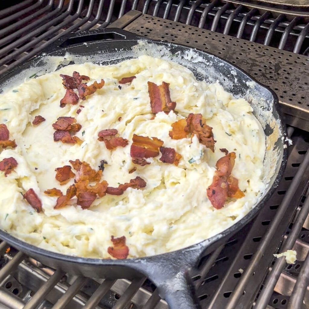 Smoked Mashed potatoes are ready for cheese. 