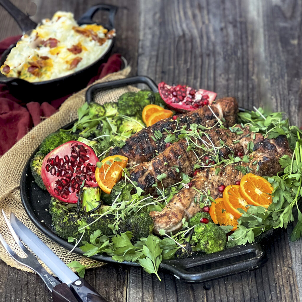 A beautiful dinner on a cast iron skillet is being shown. 