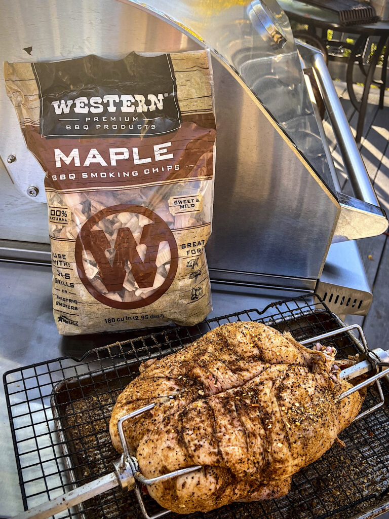 Western BBQ Maple Smoking Chips are in the background of dry brine duck. 