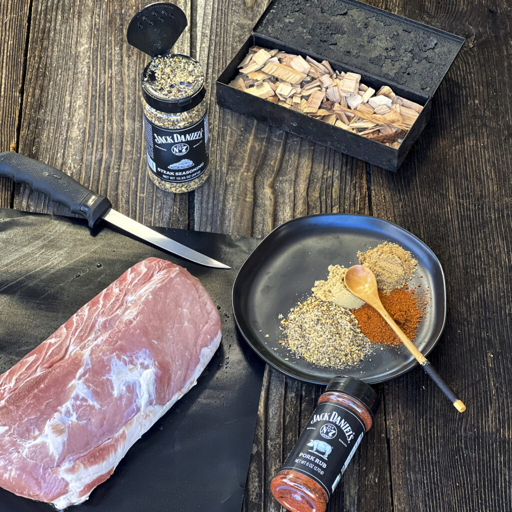 A rub of Jack Daniel's Steak and Pork Seasoning along with coriander, and brown sugar.