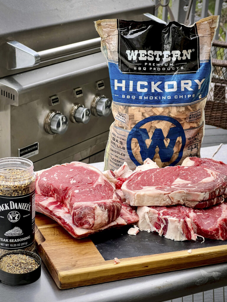 Hand Cut Ribeye Steaks are ready to be hickory smoked. 