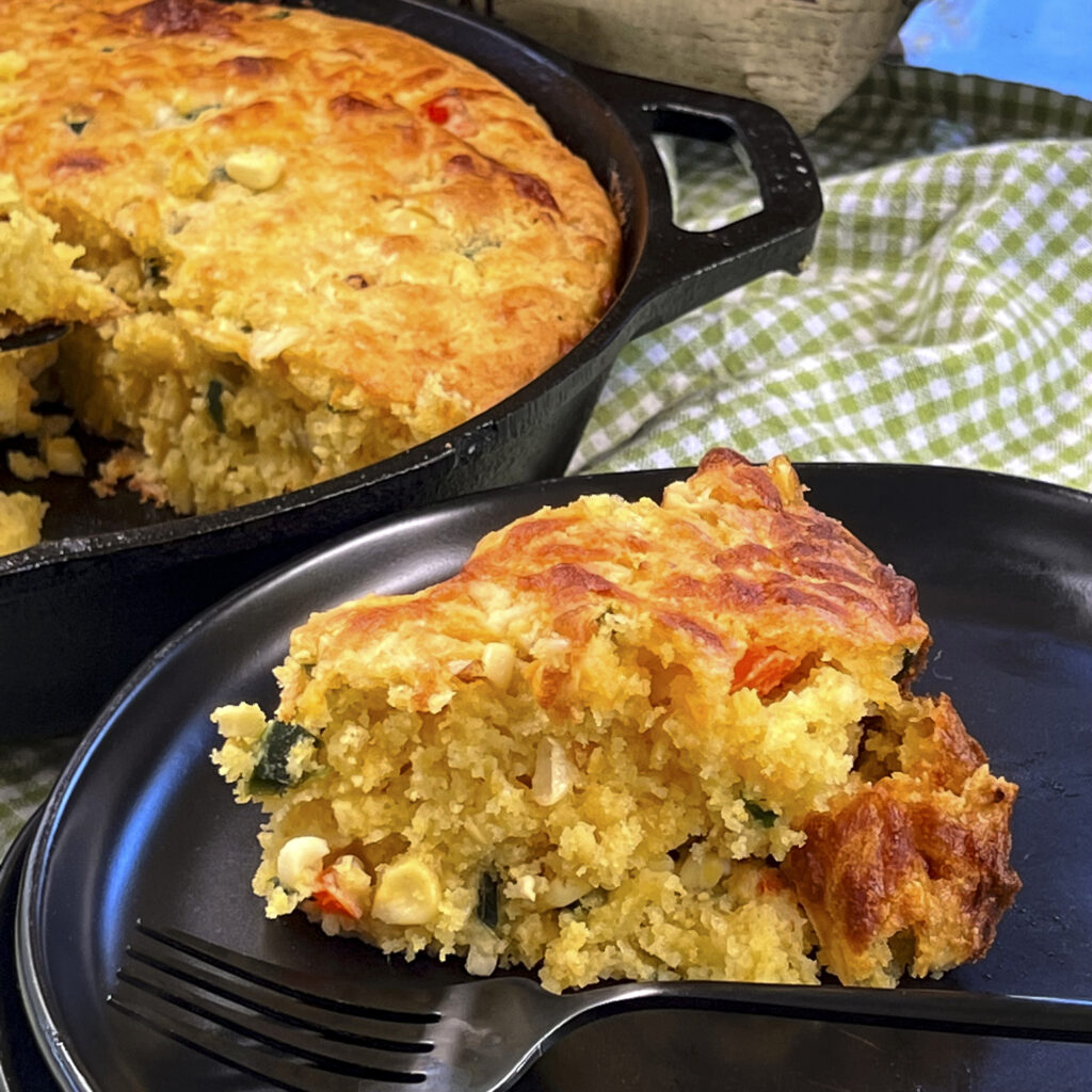A close up of baked cornbread. 