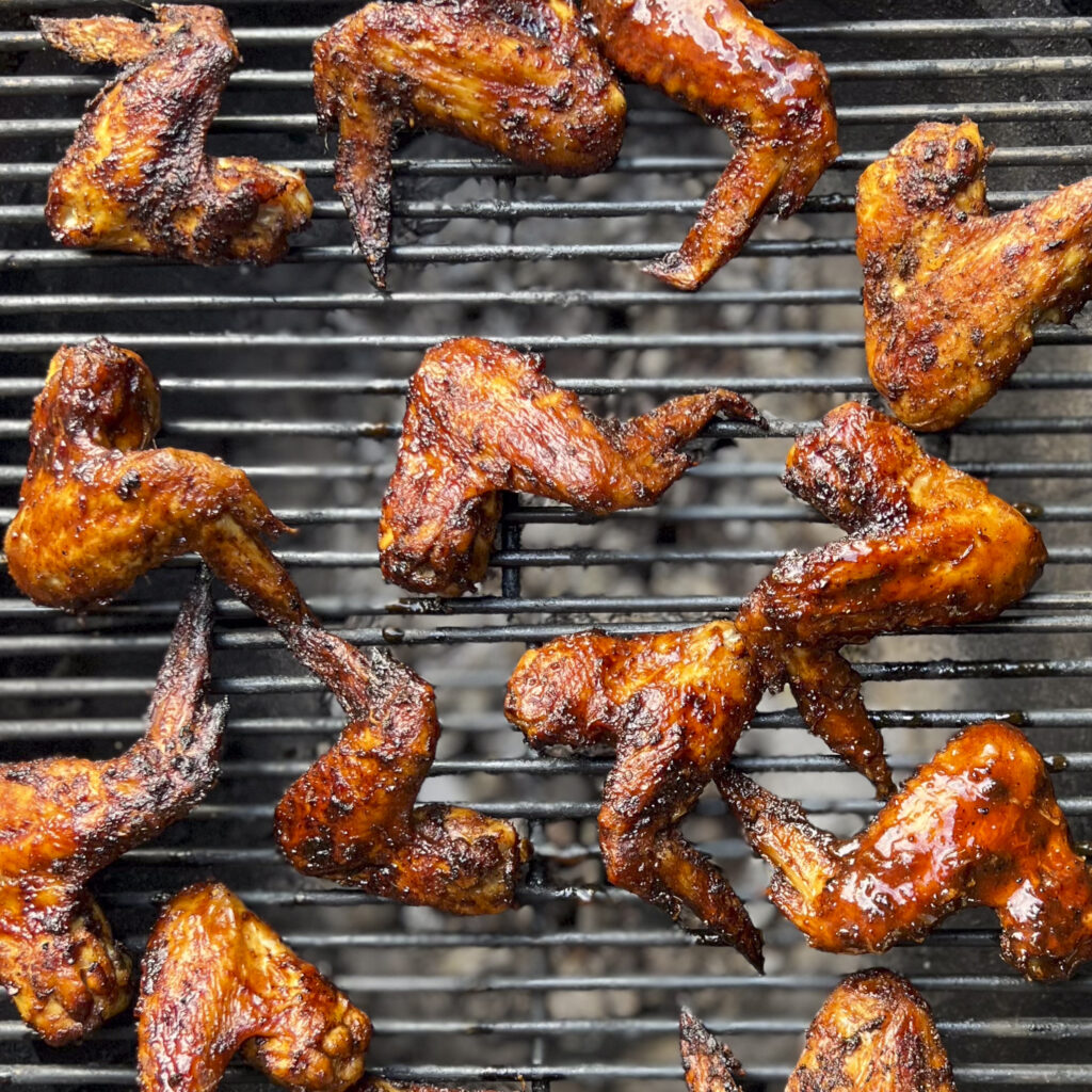 Chicken Wings are on the grill. 