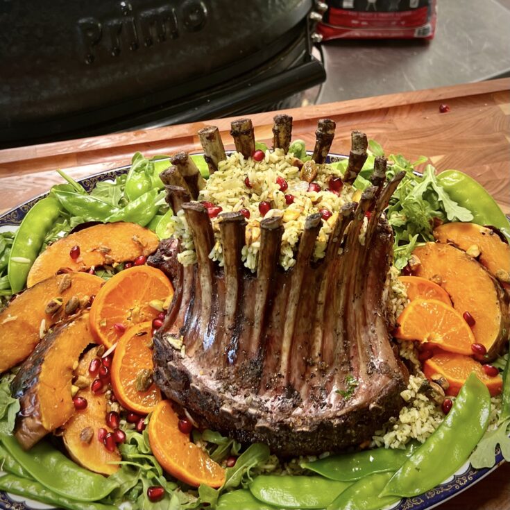 Smoked Rack of Lamb is plated and ready to eat.