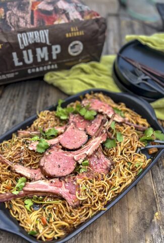 Double-Cut Lamb Chops are on a bed of ramen.