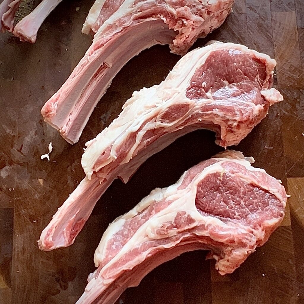 Cut rack of lamb into 2-rib portions. 